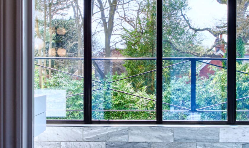 aluco steel look windows in an extension built on a flat roof