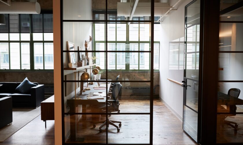 picture of a home office with glass dividers