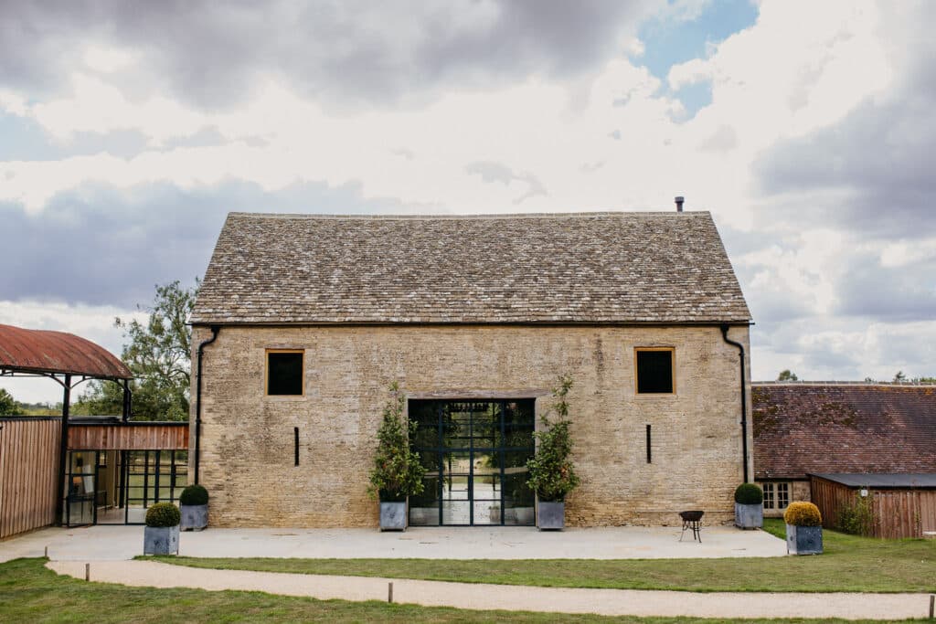 Wedding venue Cotswolds barn with  black industrial style barn doors