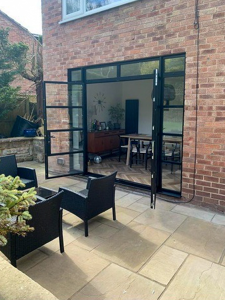 black aluco steel look French doors in Cheshire house to existing opening