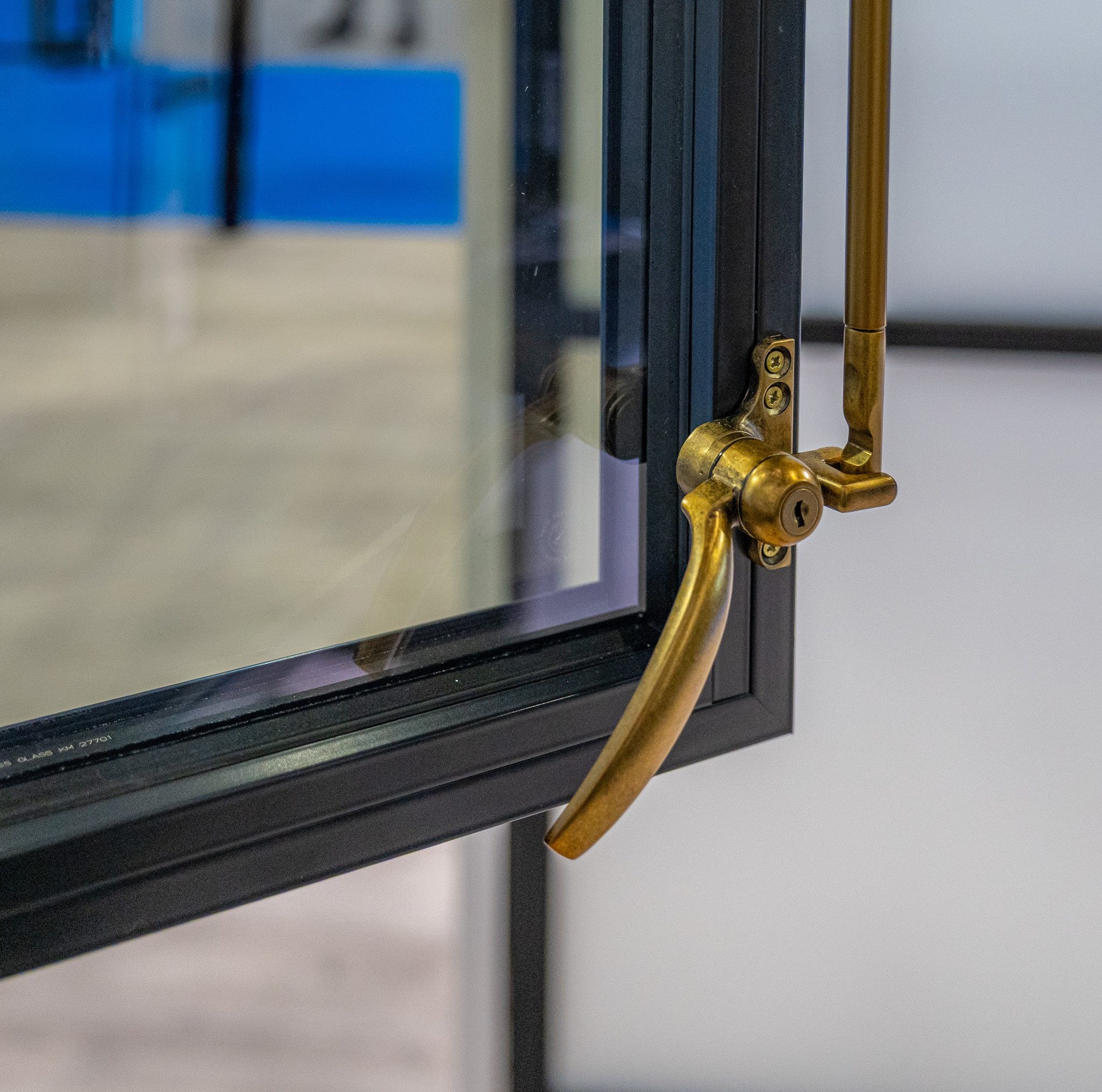 picture of aluco Elite window fitted with period brass duplex window lock at the bottom of the window.