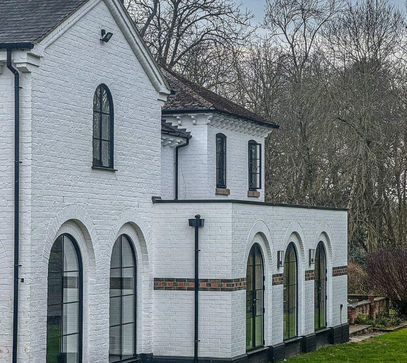 aluco curved aluminium windows in the steel look to a white period house in the west midlands