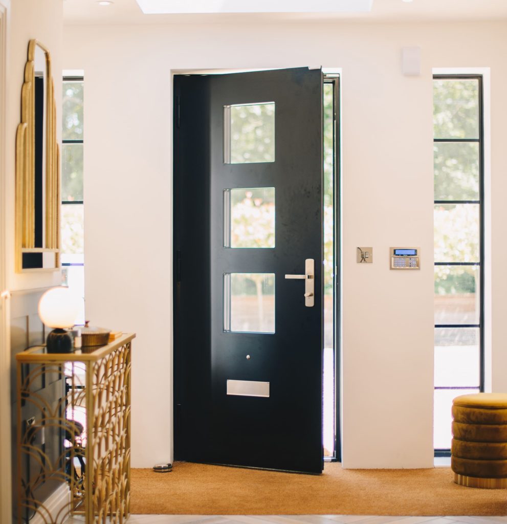 partially open front door with Aluco side screens